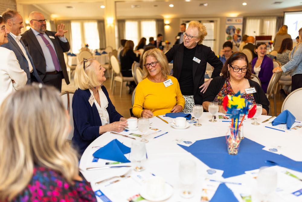 group of people sitting at table