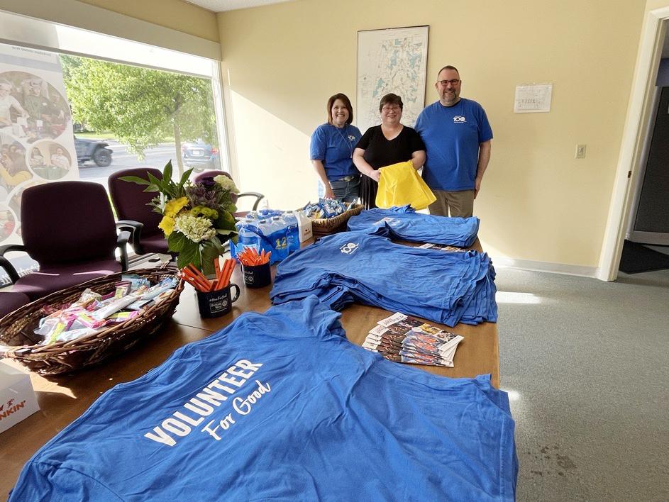 BUW's Brenda Petell, left, and Tom Bernard, right, with Downtown Pittsfield's Rebecca Brien