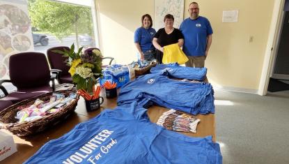 BUW's Brenda Petell, left, and Tom Bernard, right, with Downtown Pittsfield's Rebecca Brien