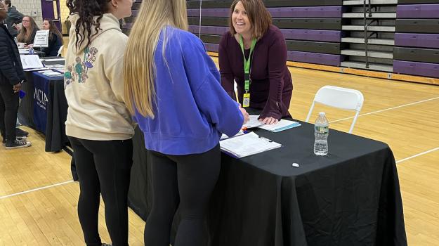 BUW's Brenda Petell helps Pittsfield High students understand health insurance