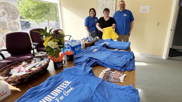 BUW's Brenda Petell, left, and Tom Bernard, right, with Downtown Pittsfield's Rebecca Brien