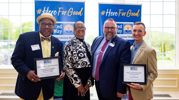 Award recipients Manny and Vannessa Guess Slaughter, BUW President and CEO Tom Bernard, and Alex Reczkowski