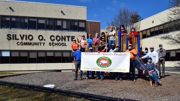 Team from Pittsfield UNICO cleaned up around Silvio O. Conte Community School.